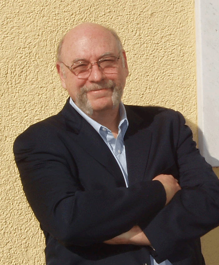 Portrait of Hugh Silverman wearing a suit