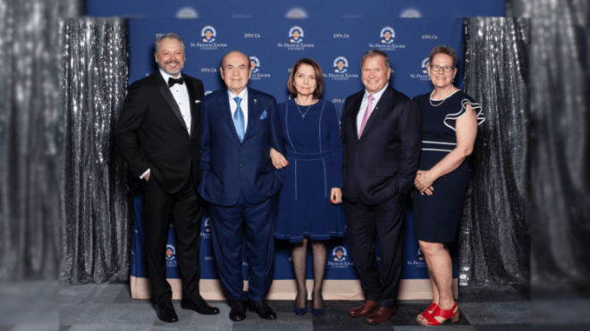 Five people standing together