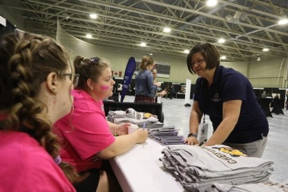 Student Life Director Jacqueline De Leebeeck speaks with student leaders on Welcome Day.